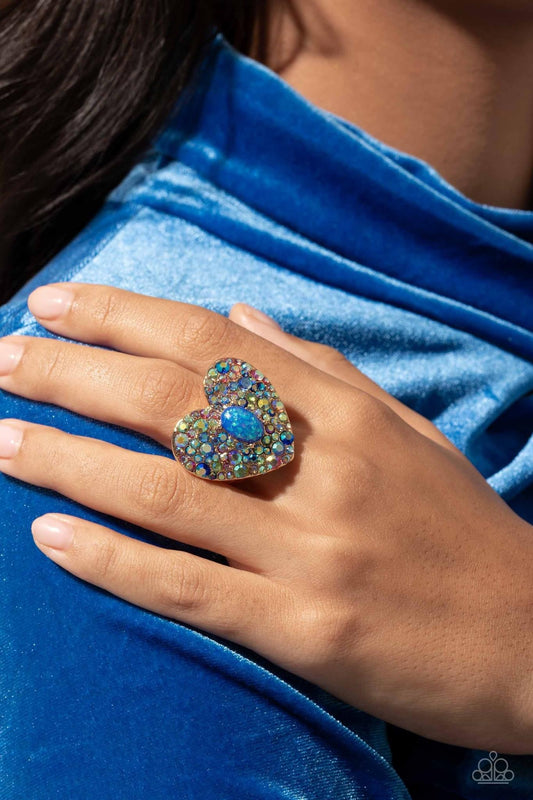 Paparazzi - Bejeweled Beau” - Blue and Multi-Iridescent Ring