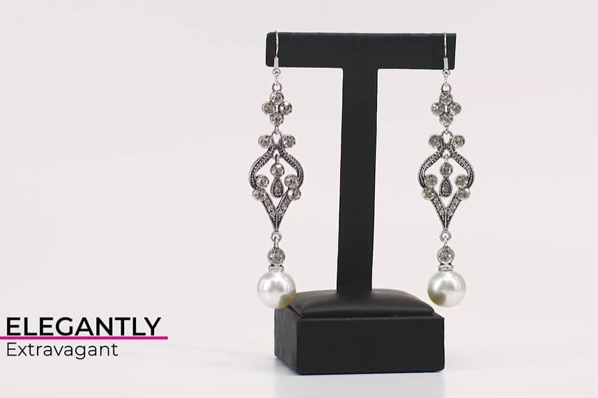 Paparazzi- Elegantly Extravagant White Earrings